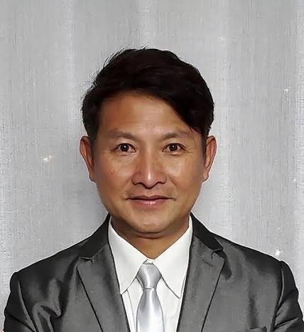 張偉成醫生深色西裝正式頭像